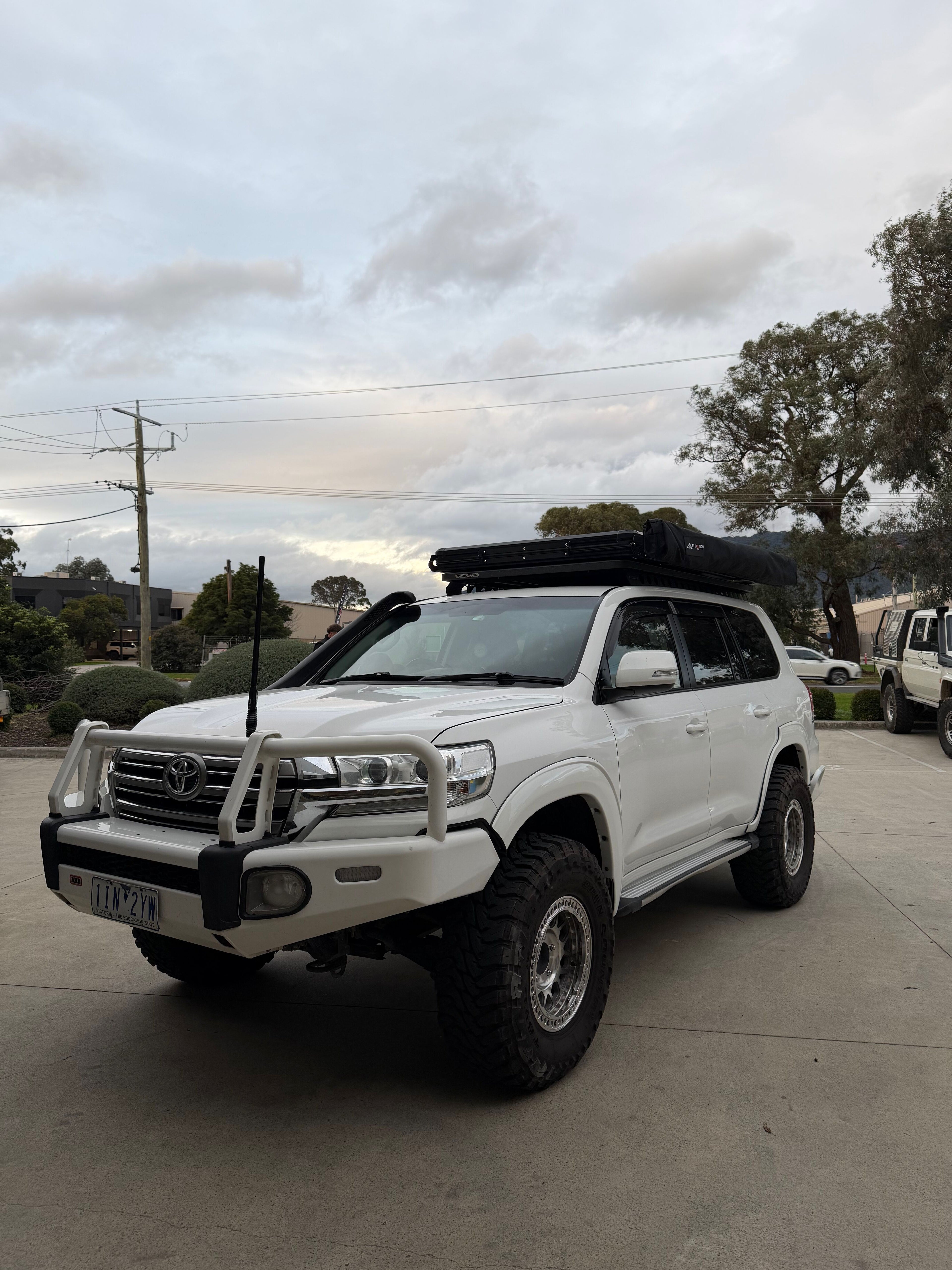 Toyota landcruiser with rooftop tent and awning package