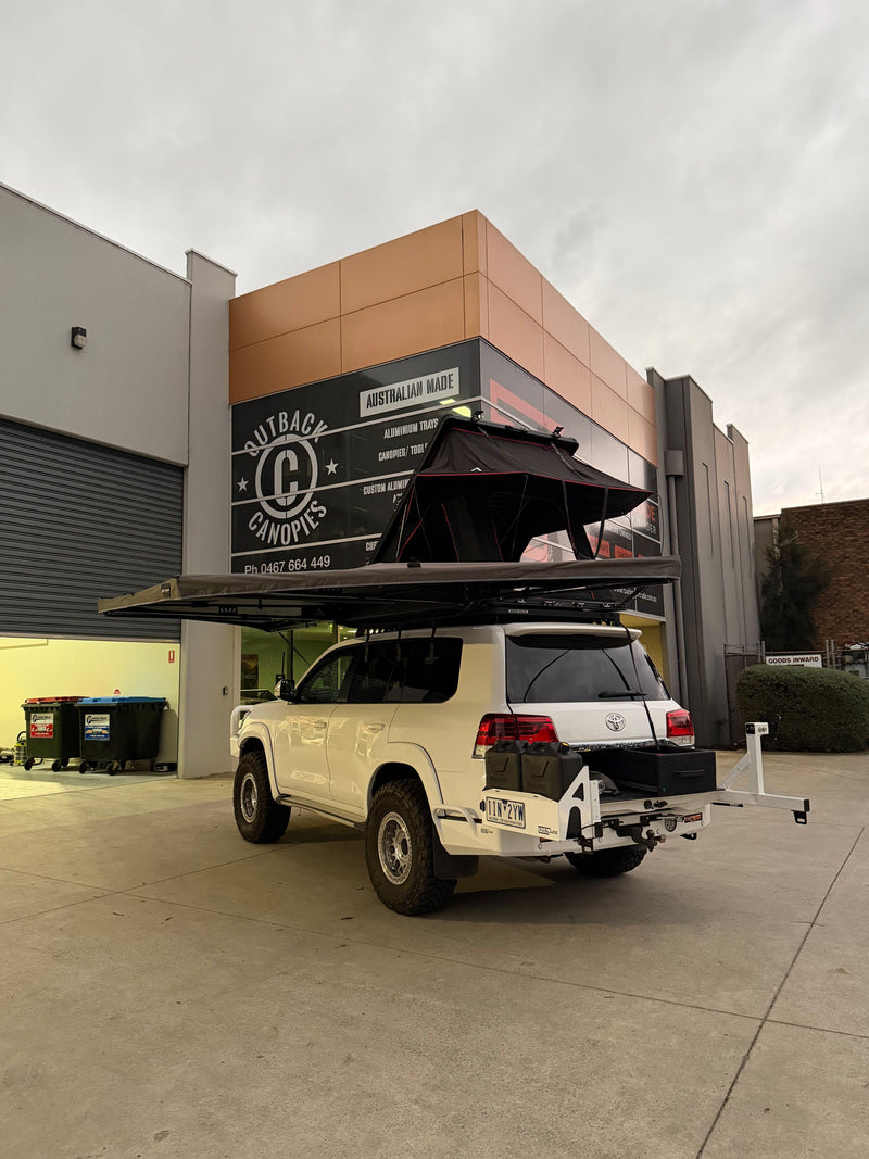 Slimline rooftop tent with lightweight awning